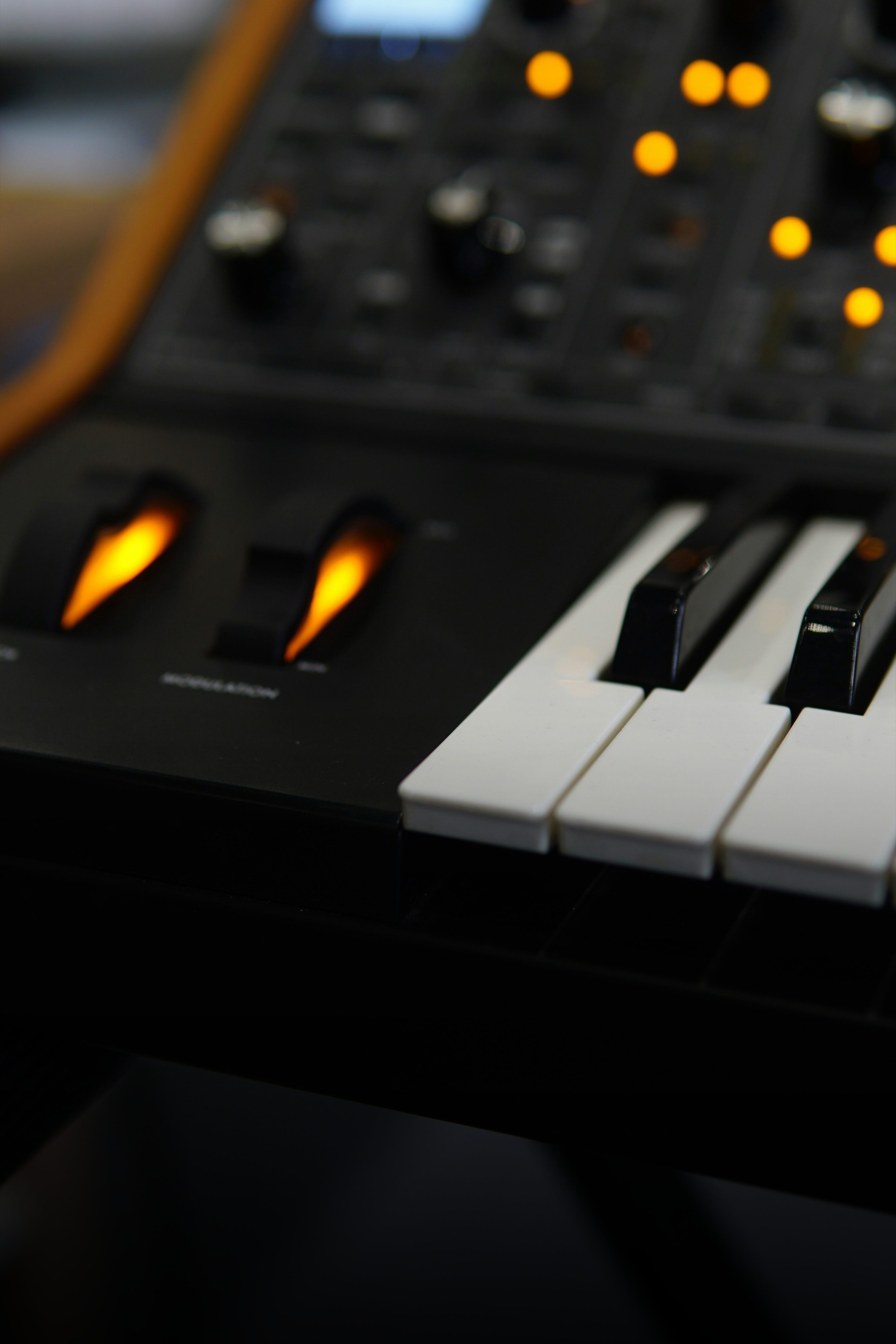 Image for the Production Music Tools MIDI Packs products section. The image shows a close-up of a MIDI controller. Visible text on the image reads: "MIDI Packs Inspired performances to kickstart your next track Shop Now" with "Shop Now" as a button